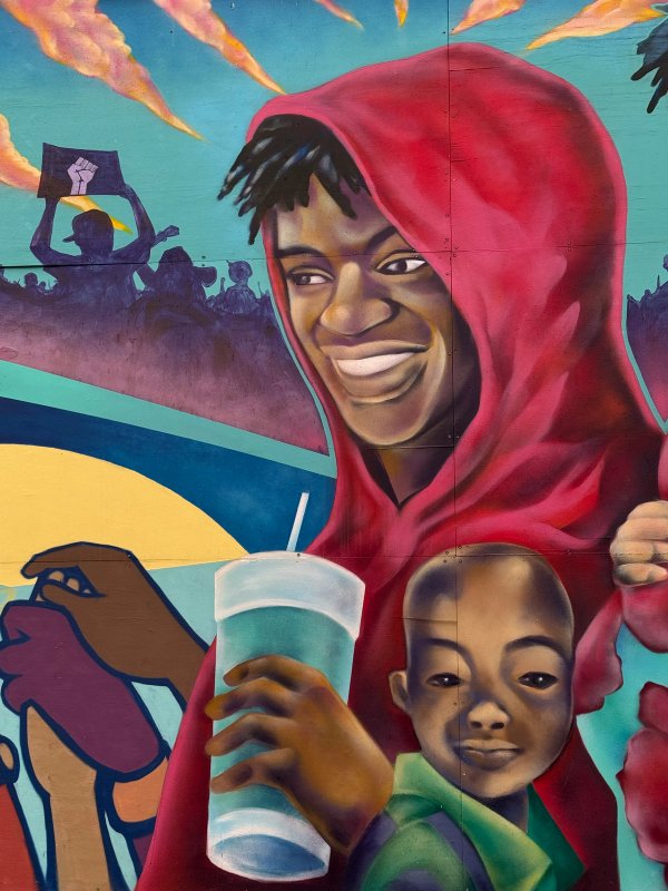 Lowertown Community Art: Powerful portrait mural by DRPN soul celebrating community and identity in Lowertown, Ottawa. Youth-led Public Art.