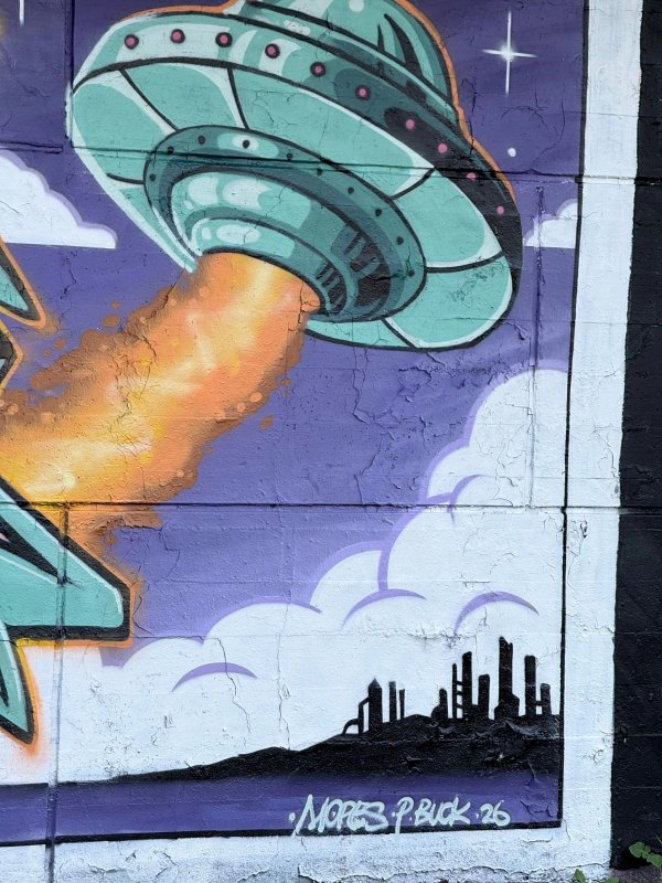 Mural artwork by Mopes - Street art in Centretown, Ottawa, Ontario