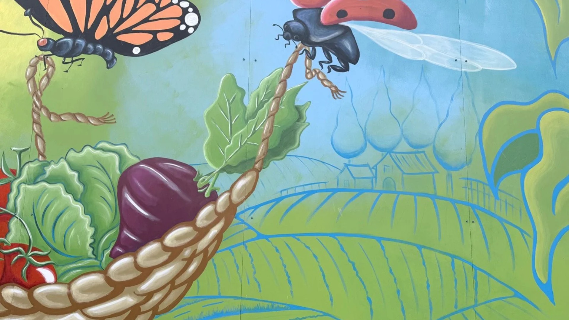 Mural artwork by Claudia Salguero - Street art in Golden Triangle, Ottawa, Ontario