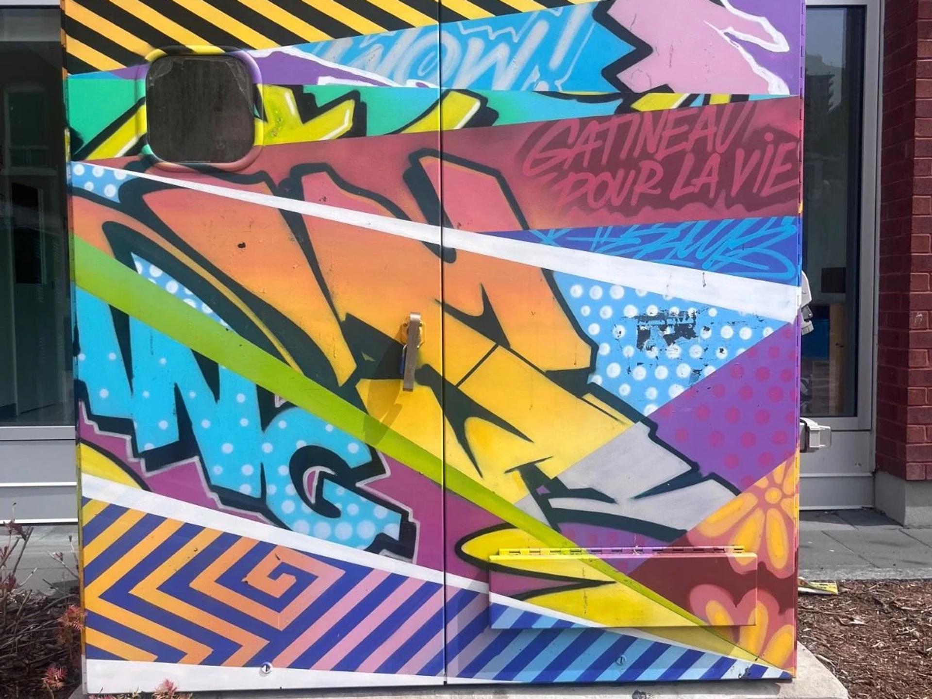 Public mural artwork in Hull, Ottawa - Street art scene