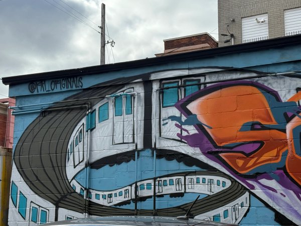 Unknown street art mural photo 2