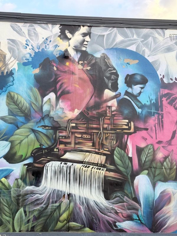 Mural artwork by Dom Laporte - Street art in Hull, Ottawa, Ontario