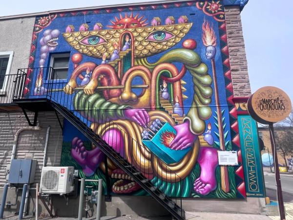 Danae Brissonnet’s 'The Matchstick Girl' mural in Hull, Gatineau. This street art piece archives the history of the E.B. Eddy factory, depicting the resilience and industrial labor struggle of 19th-century women in the National Capital Region.