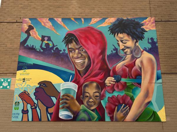 Lowertown Community Art: Powerful portrait mural by DRPN soul celebrating community and identity in Lowertown, Ottawa. Youth-led Public Art.