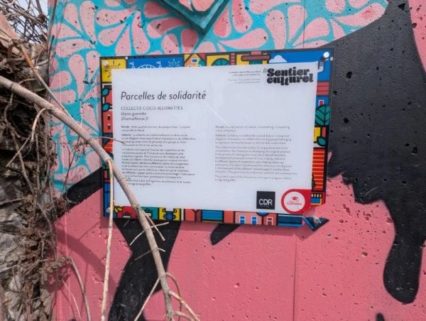 Parcelles de solidarité by COLLECTIF COCO-ALLUMETTES - Street art mural in Hull, Ottawa, Ontario