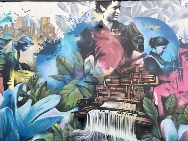 Mural artwork by Dom Laporte - Street art in Hull, Ottawa, Ontario