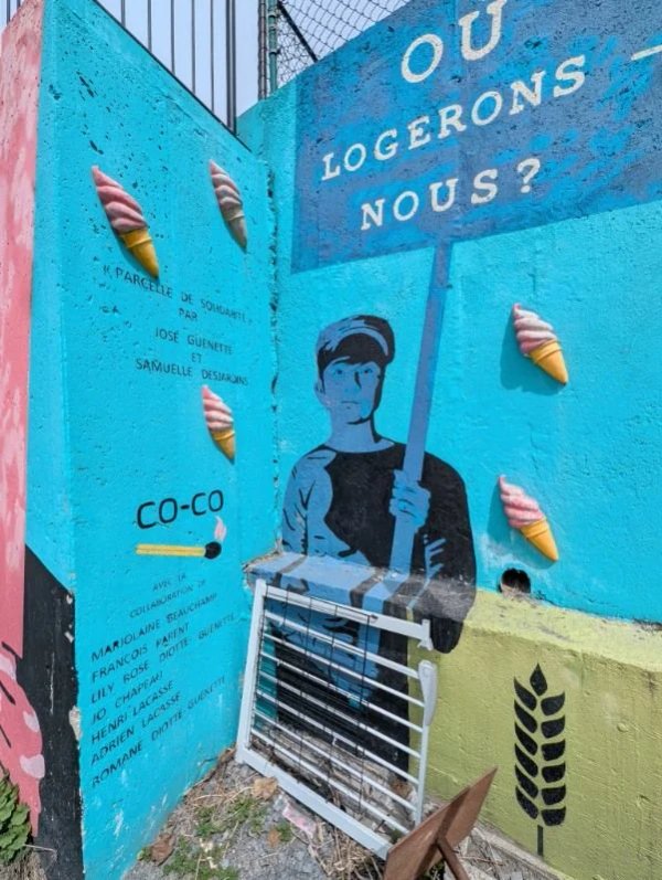 Parcelles de solidarité by COLLECTIF COCO-ALLUMETTES - Street art mural in Hull, Ottawa, Ontario