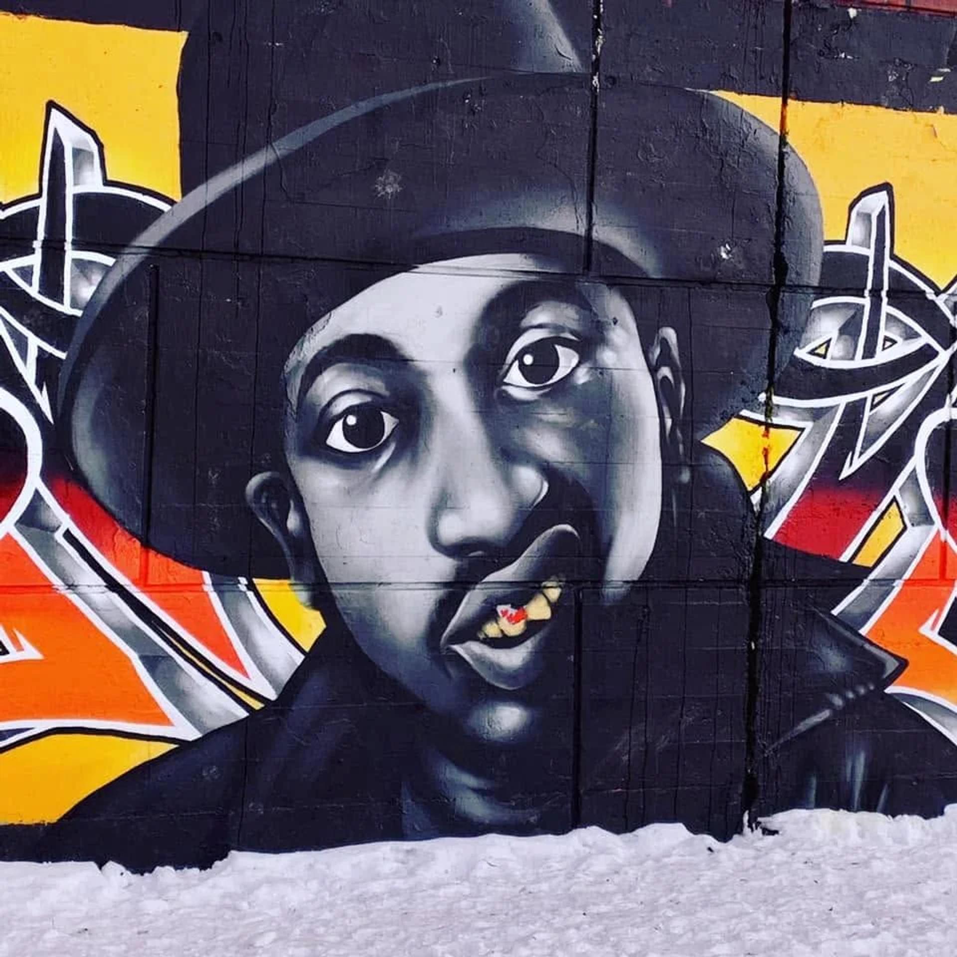 Grayscale mural of Wu-Tang's Ol' Dirty Bastard by Prank Sinatra at the 575 Laurier Ave W Tech Wall legal graffiti wall in Ottawa.
