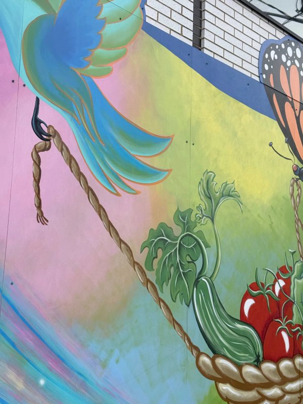 Mural artwork by Claudia Salguero - Street art in Golden Triangle, Ottawa, Ontario