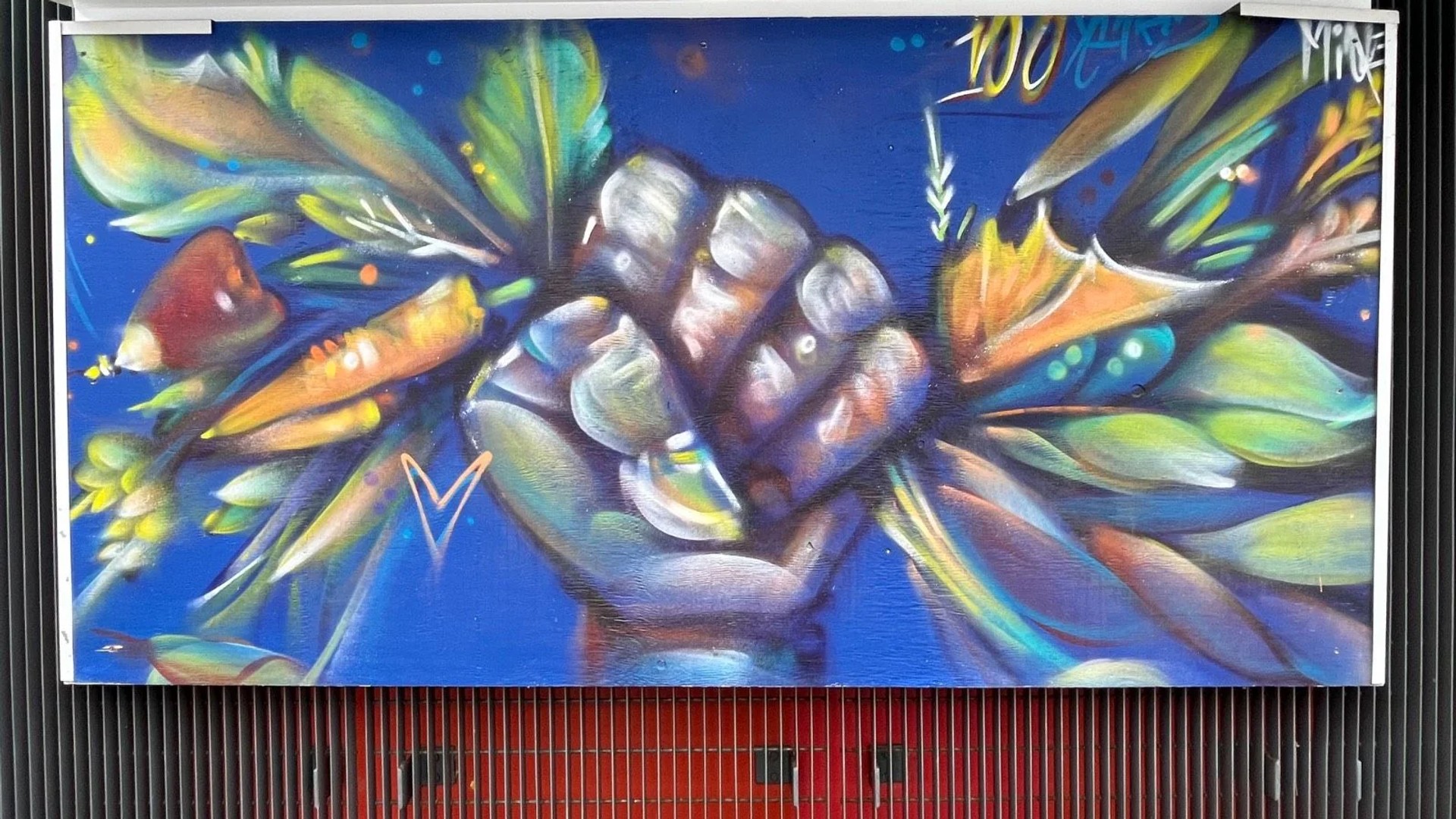 Mural artwork by Mique Michelle - Street art in Hintonburg, Ottawa, Ontario
