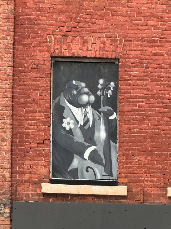 Ghost band street art mural photo 1