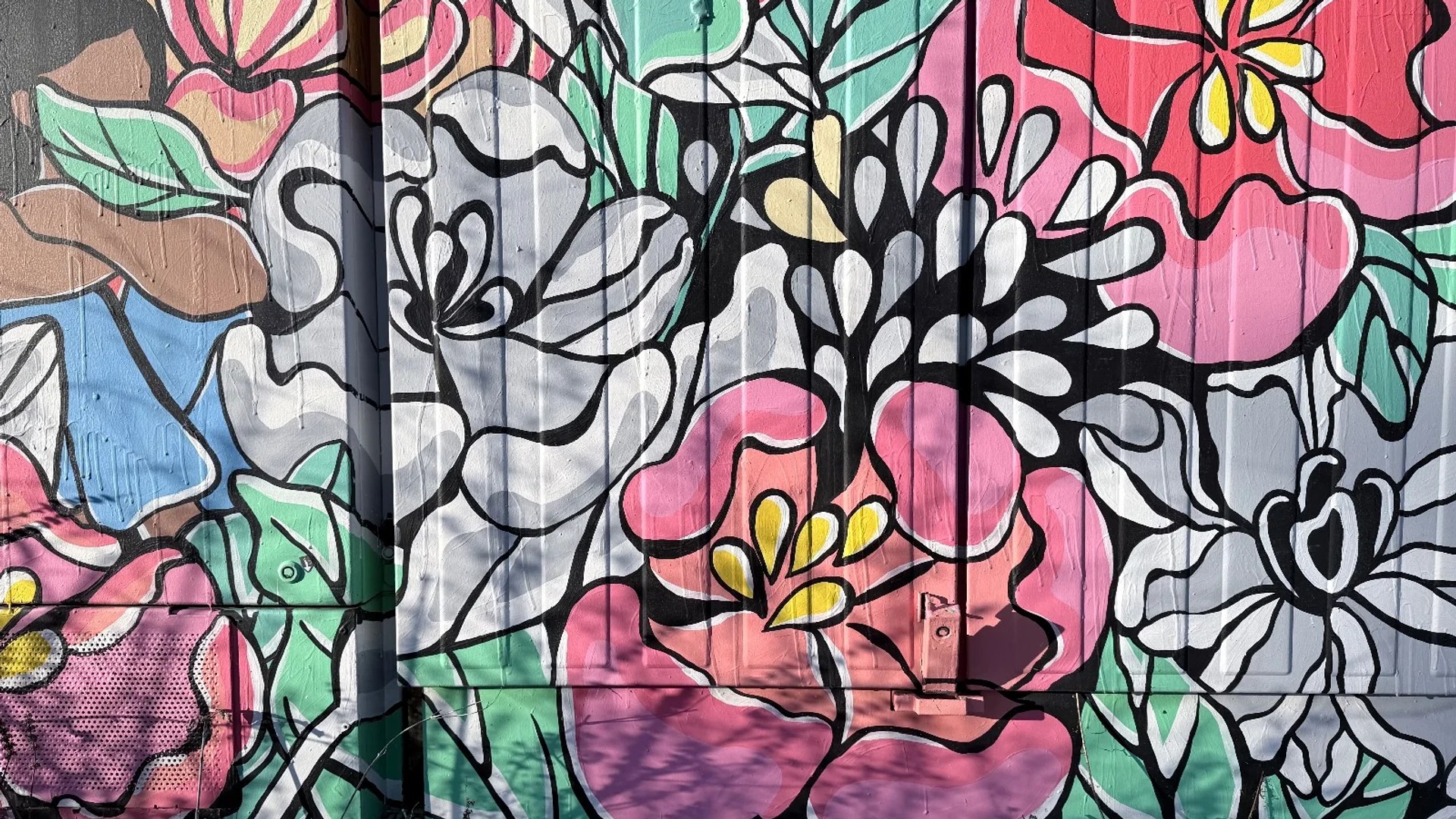 Racism is a Pandemic Too by Maya Hum - Mural in Hintonburg, Ontario