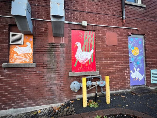 Public art installation in downtown Ottawa (Centretown), a colorful, large-scale mural enriching the urban landscape.