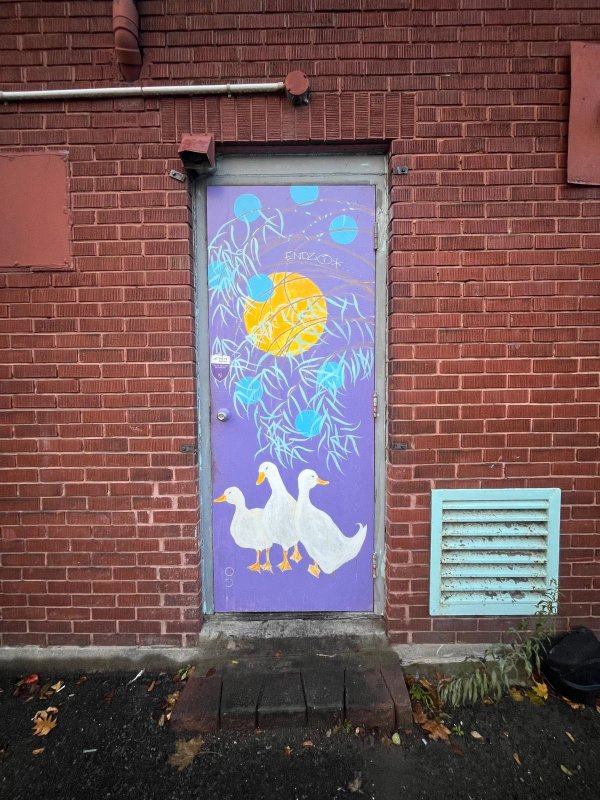 Public art installation in downtown Ottawa (Centretown), a colorful, large-scale mural enriching the urban landscape.