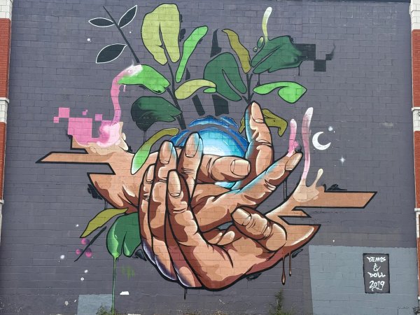 Unknown street art mural photo 1