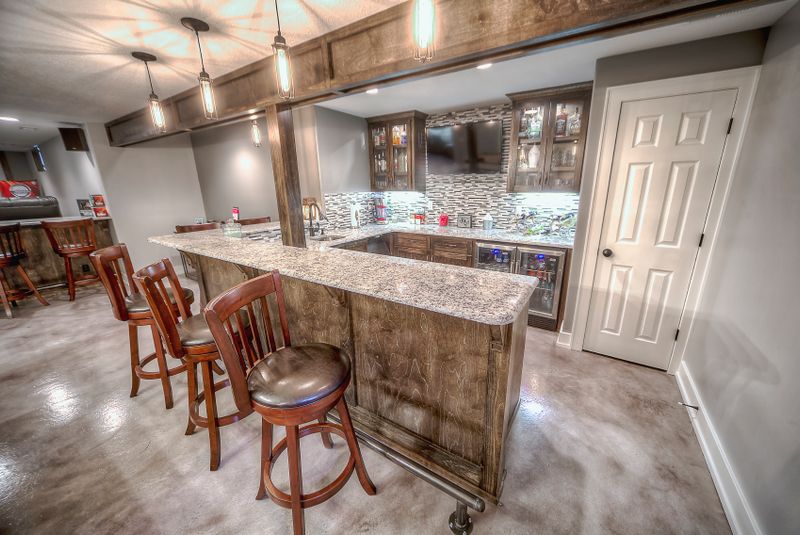 Finished basement by All Under One Roof, Kansas City