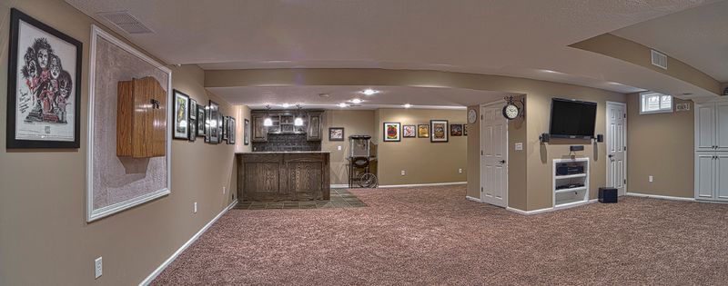 Finished basement by All Under One Roof, Kansas City