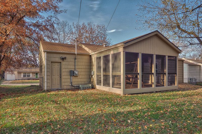 Screened porch with gabled roof built by All Under One Roof, Kansas City