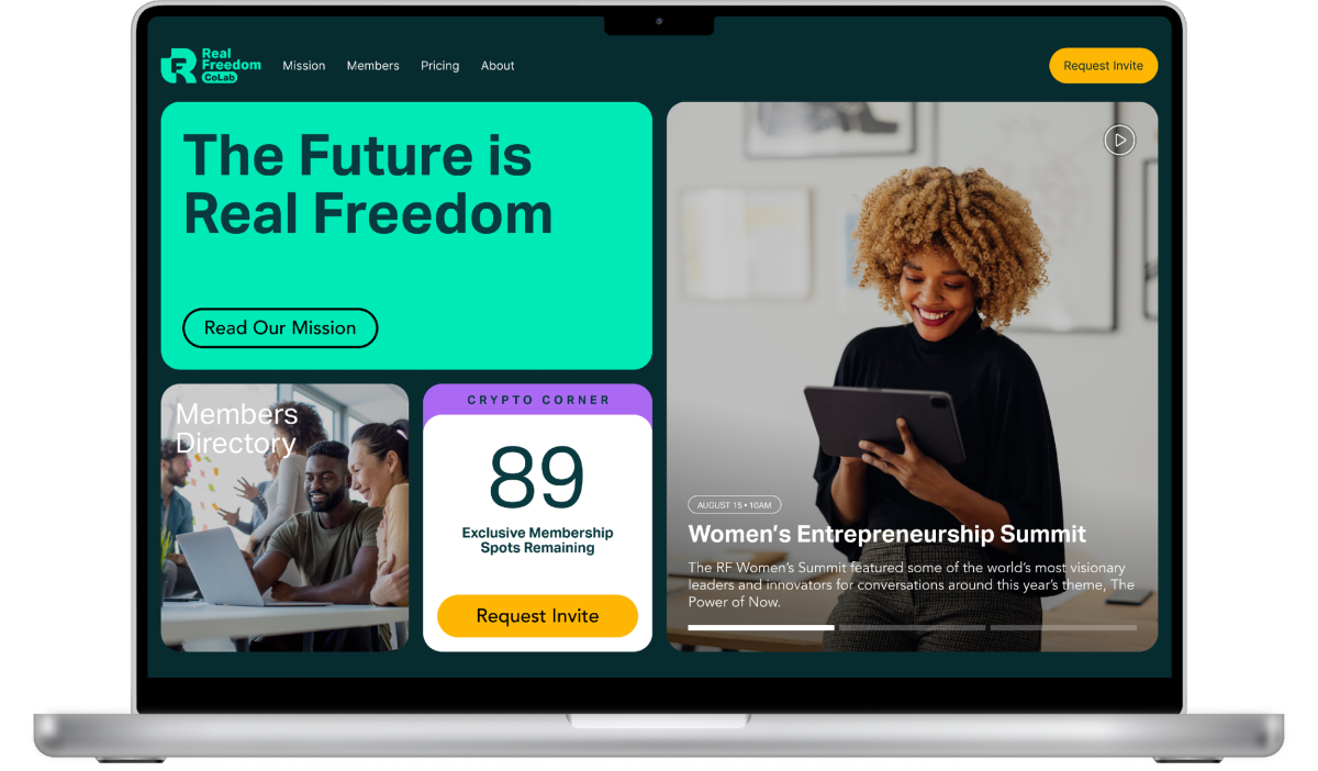 Real Freedom CoLab website homepage mockup on a laptop with mint green hero