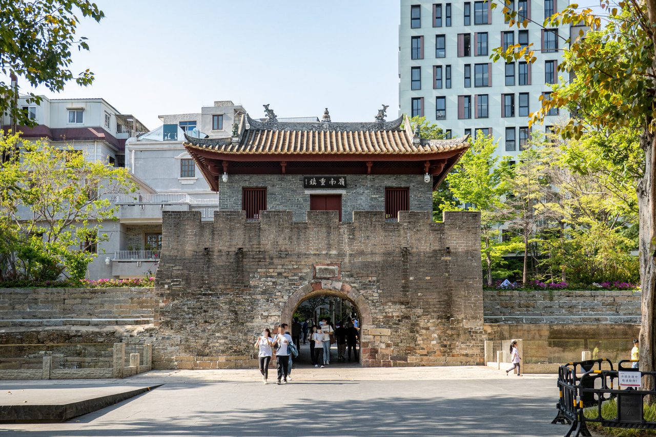 The historic south gate tower of Nantou Ancient City under a blue sky
