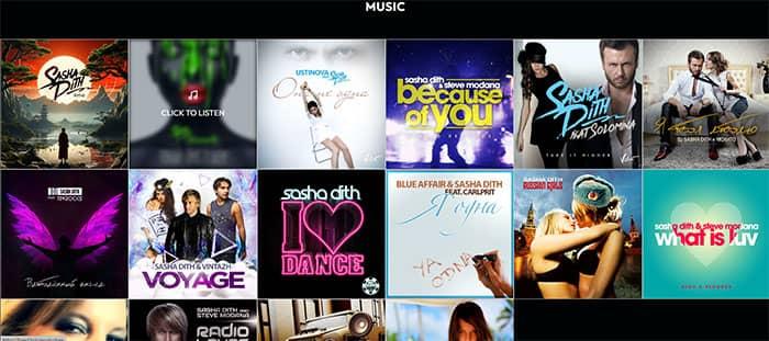 Сетка обложек синглов и альбомов с прямыми ссылками на Spotify, Apple Music и YouTube Music.