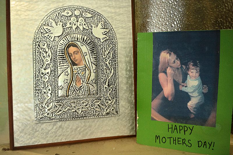 happy mothers day card next to a religious artwork
