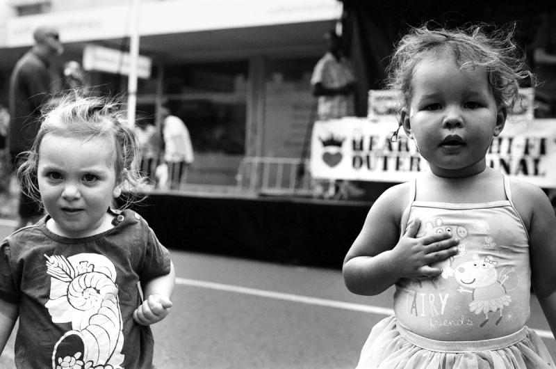 a black and white photo of two children at the heretical hi-fi outernational party at the Sydney road festival