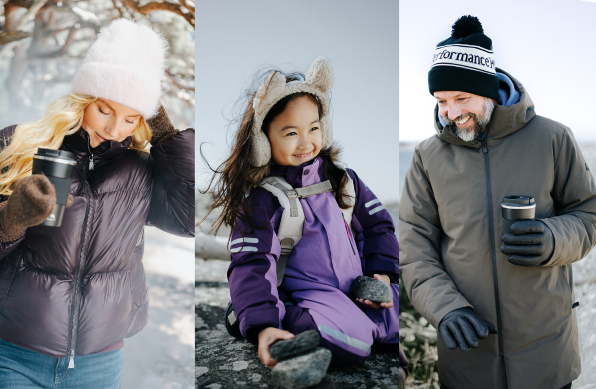 A woman, child, and man wearing winter clothes outdoors. The adults hold travel mugs and the child holds rocks.