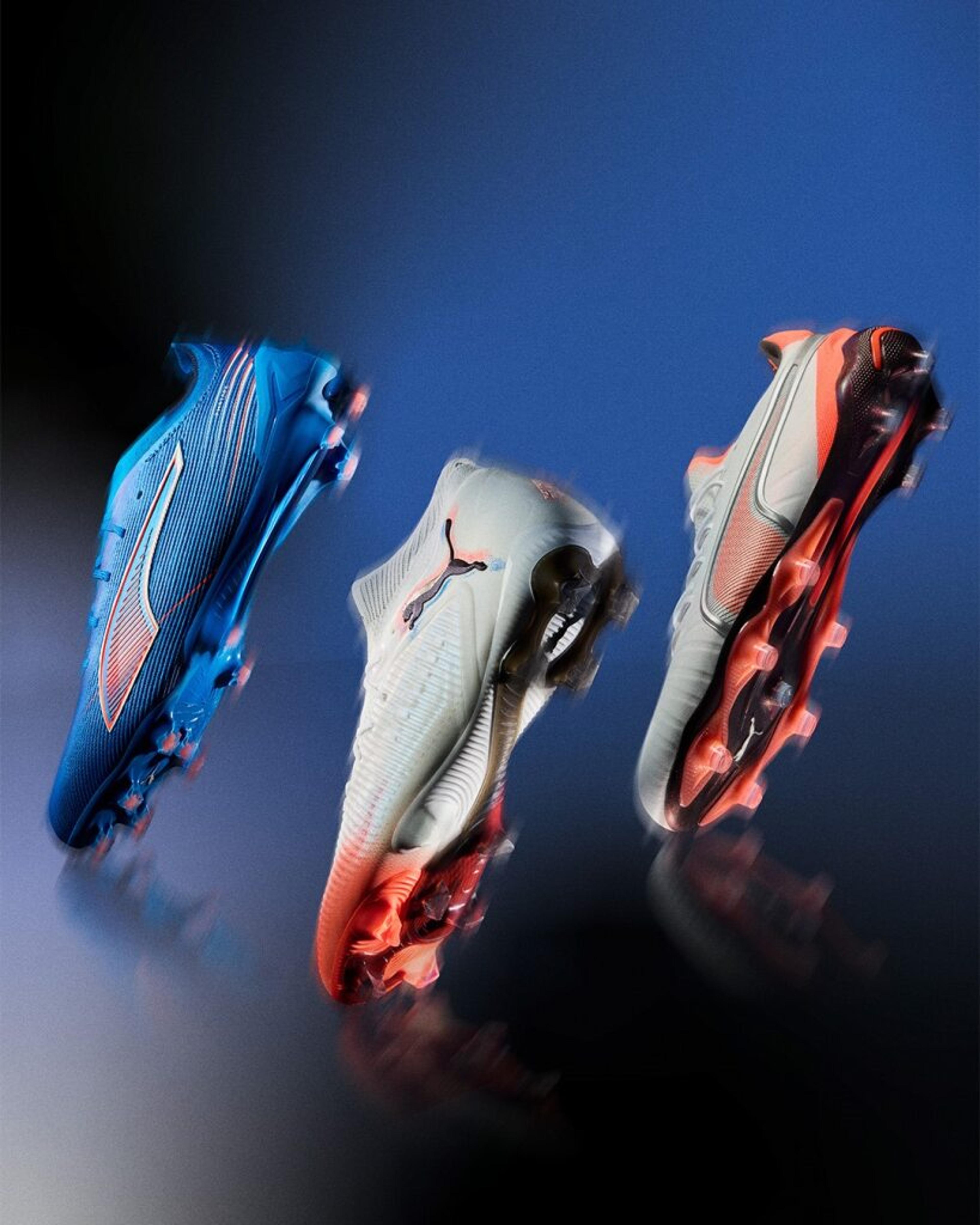 three different colored soccer cleats from Puma on a blue background