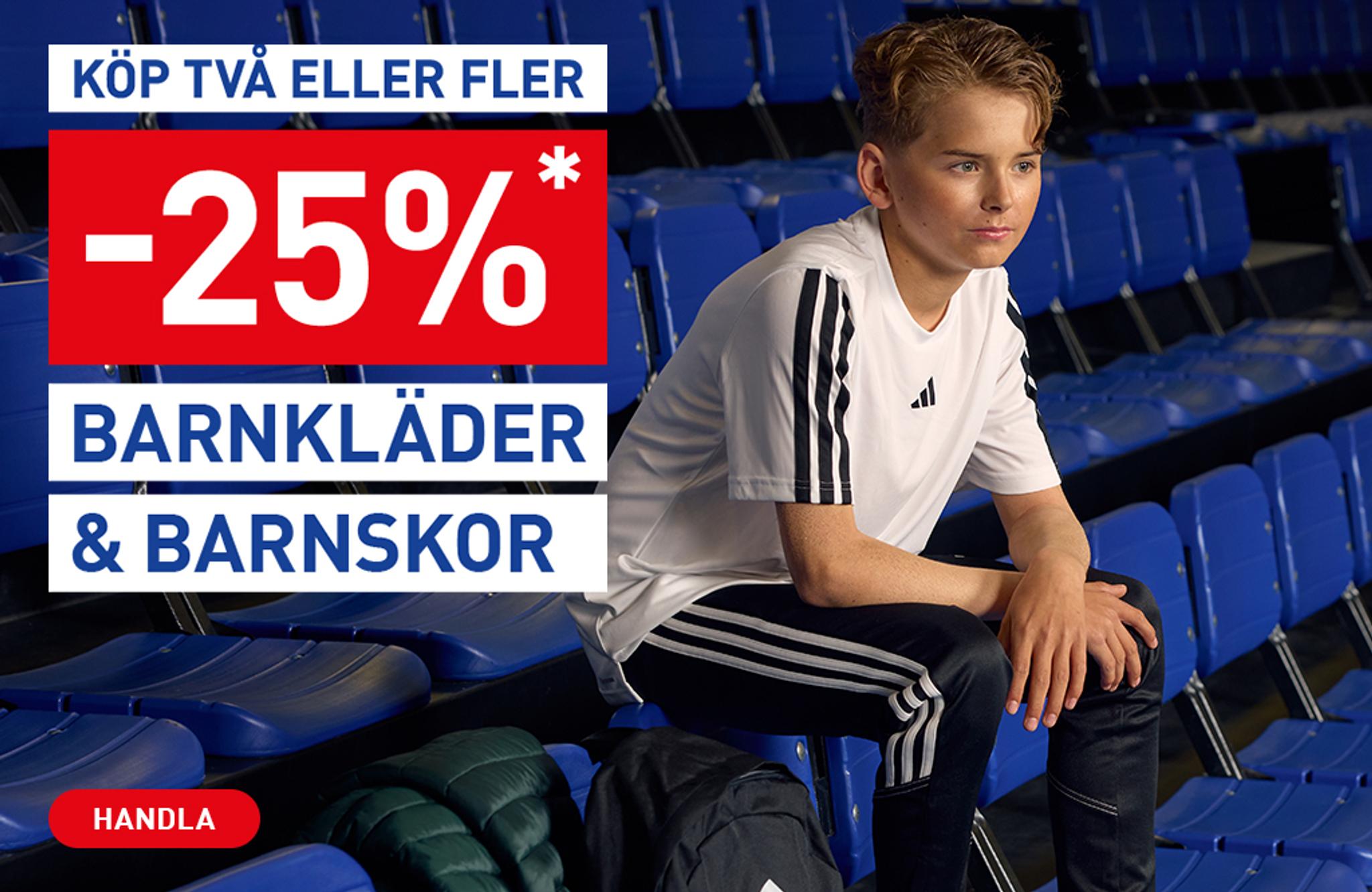 A young boy in sportswear sits on blue bleachers next to a banner advertising 25% off children's clothes and shoes.