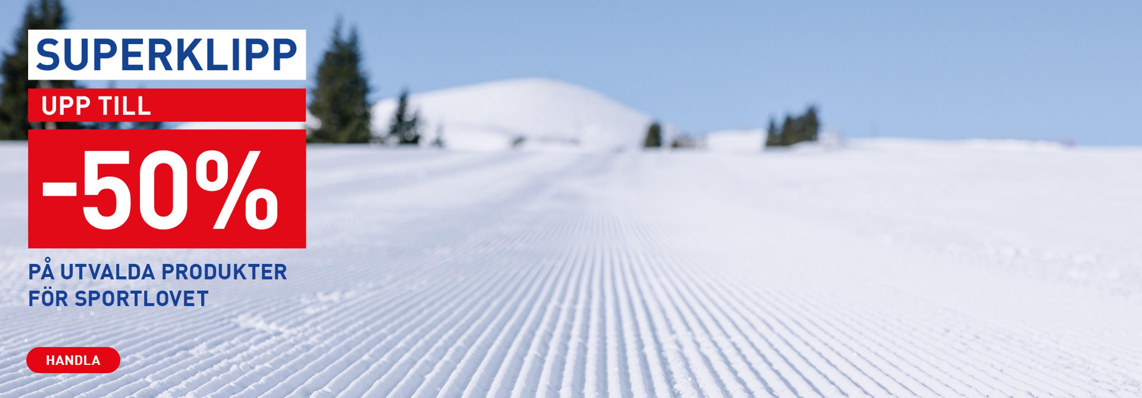 Advertisement: "Super Deal, Up to -50% off for sports holiday," against a groomed ski slope.