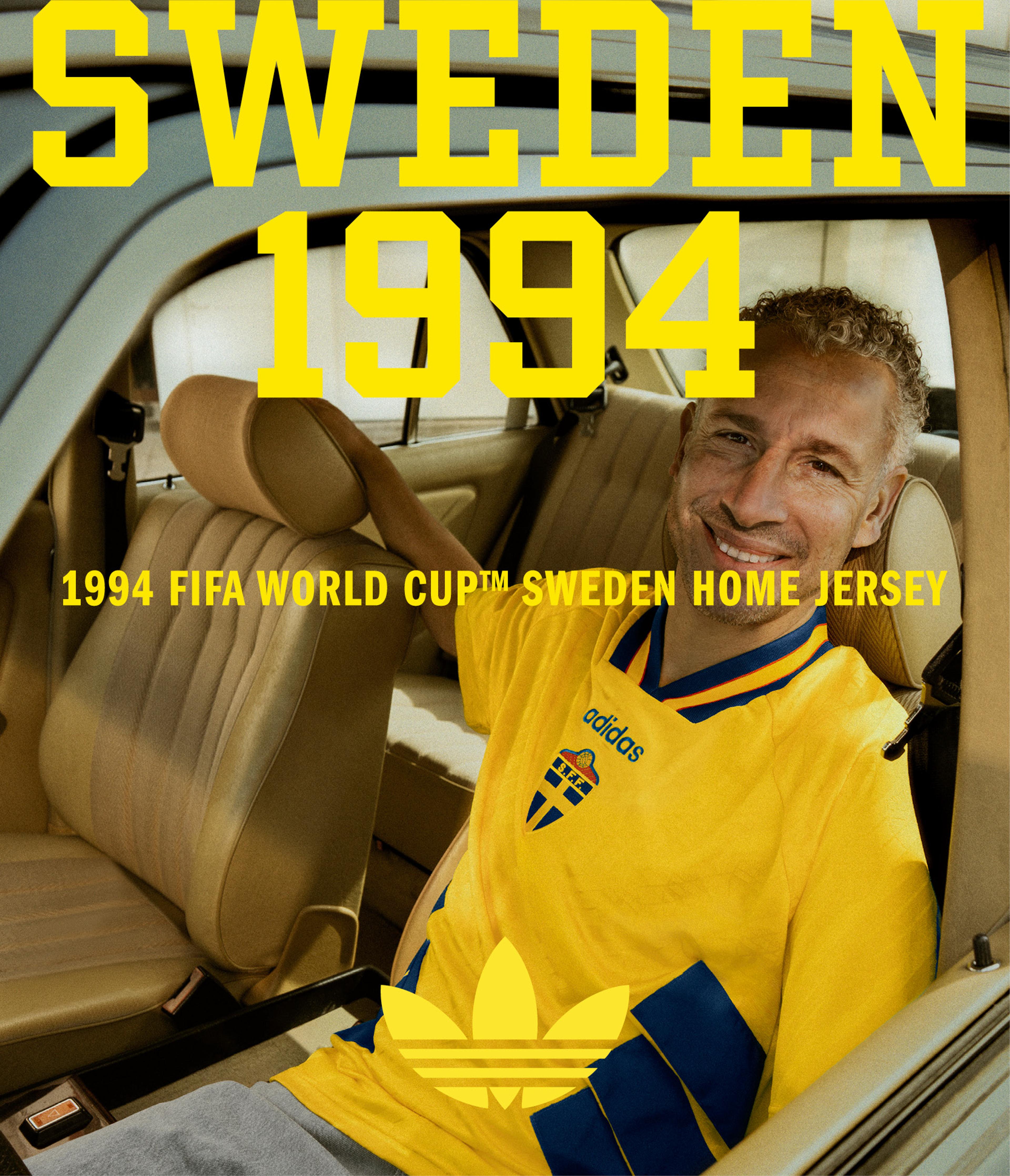 A smiling man in a yellow and blue 1994 Sweden FIFA World Cup home jersey sits in a car. Text overlay: SWEDEN 1994.