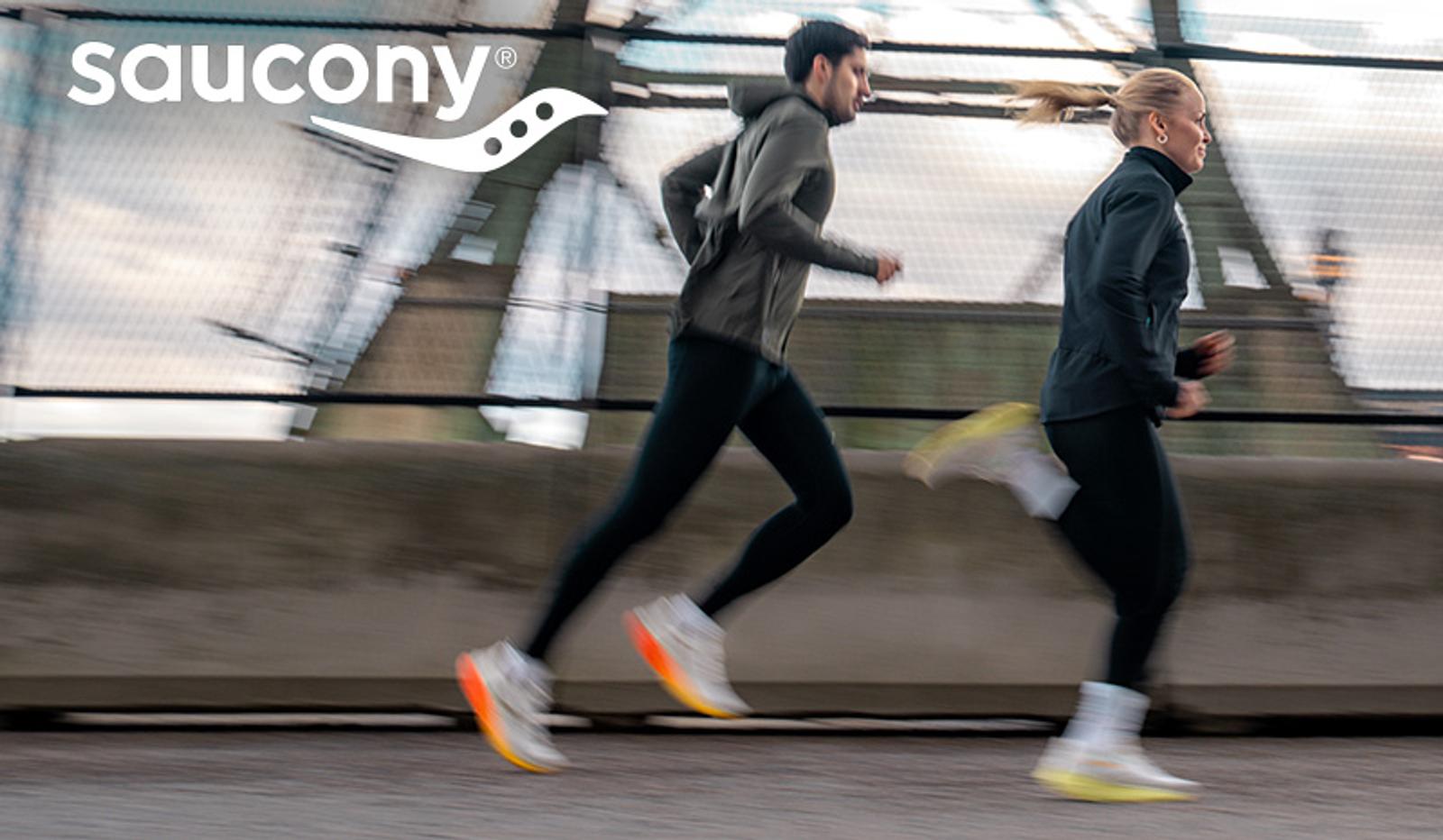 Saucony logo and two runners in motion blur.