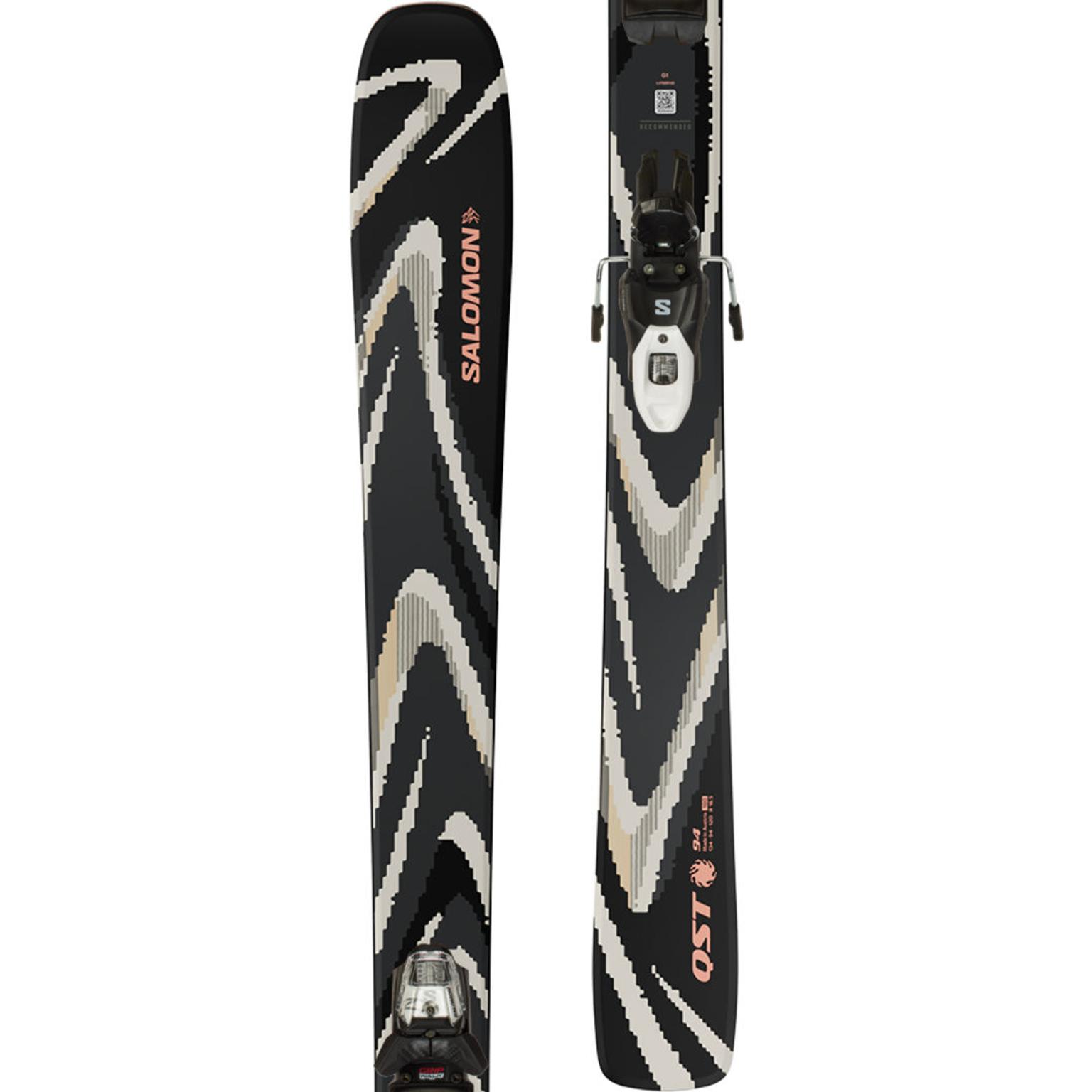 Pair of black Salomon QST 94 skis with wavy white, grey, and peach stripes and bindings.