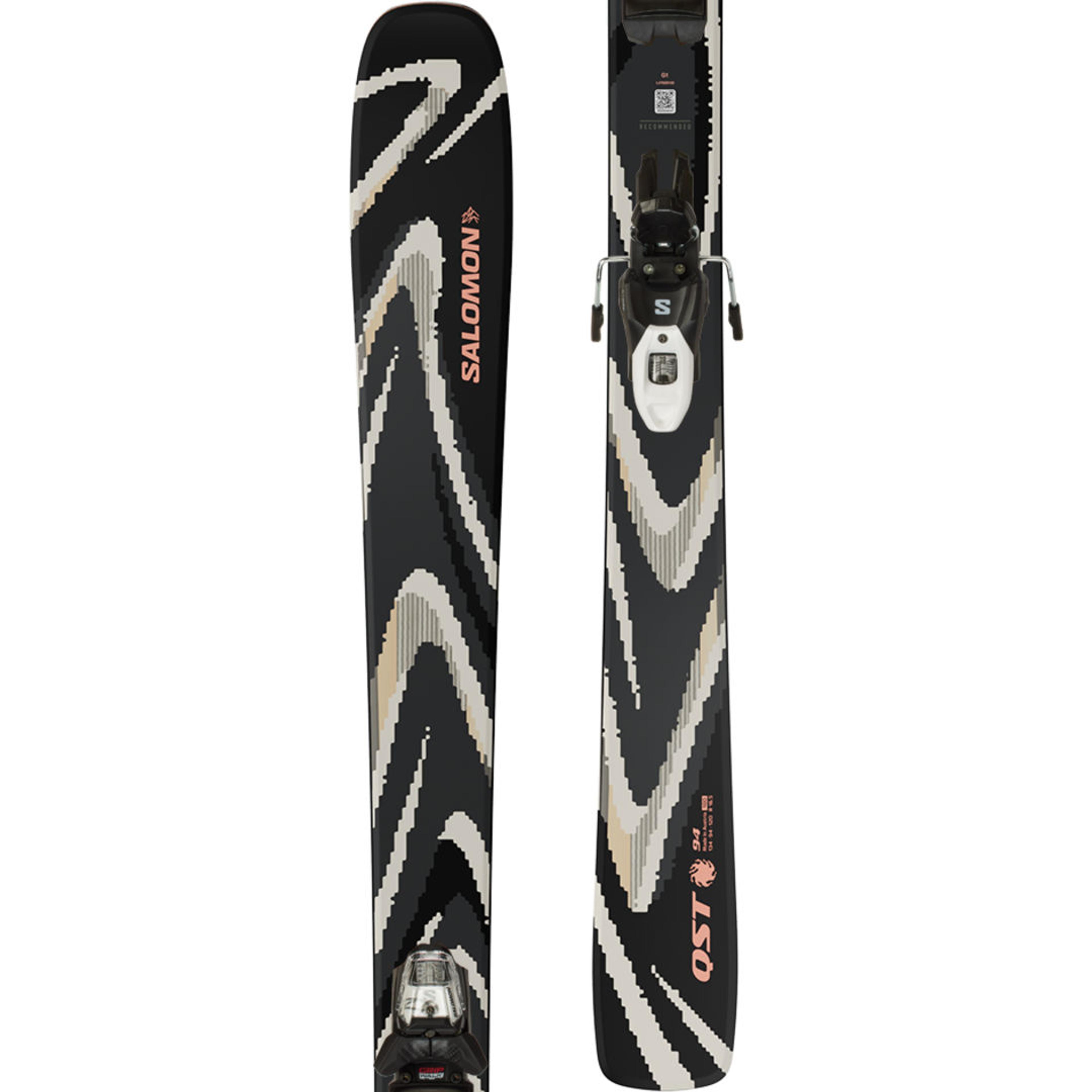 Pair of black Salomon QST 94 skis with wavy white, grey, and peach stripes and bindings.