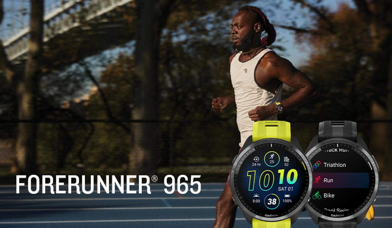A man runs on an outdoor track, with two Garmin Forerunner 965 smartwatches displayed prominently in the foreground. One watch has a yellow band showing time and stats, the other a black band listing activities. Text: FORERUNNER® 965.