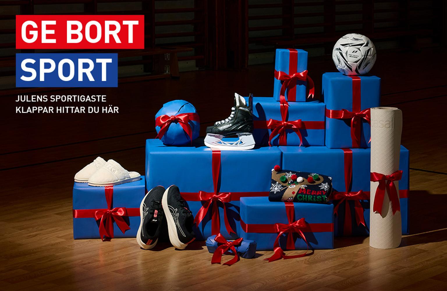 Advertisement for sports gifts, showing a pyramid of blue boxes with red ribbons, featuring items like a soccer ball, ice skate, and sneakers. Text: "GE BORT SPORT" (Give Away Sports).