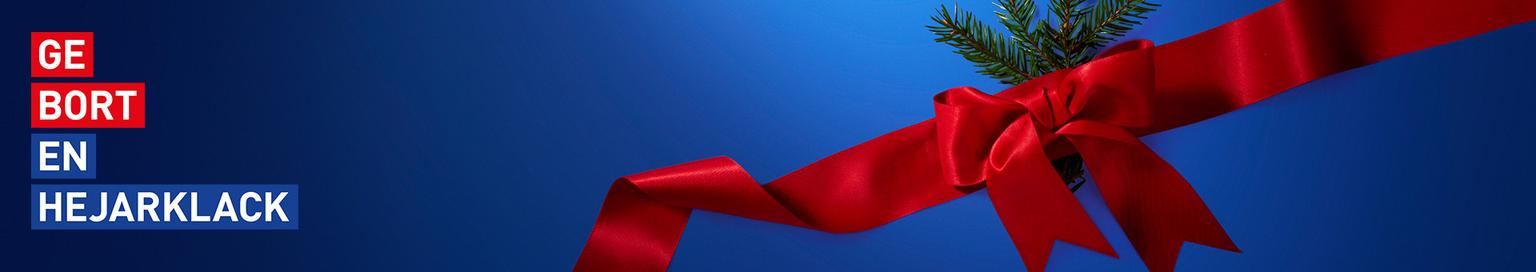 A blue banner with a red ribbon bow, green pine needles, and text "GE BORT EN HEJARKLACK."
