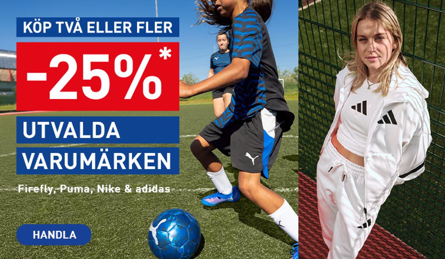 a woman is standing next to a soccer player on a field .