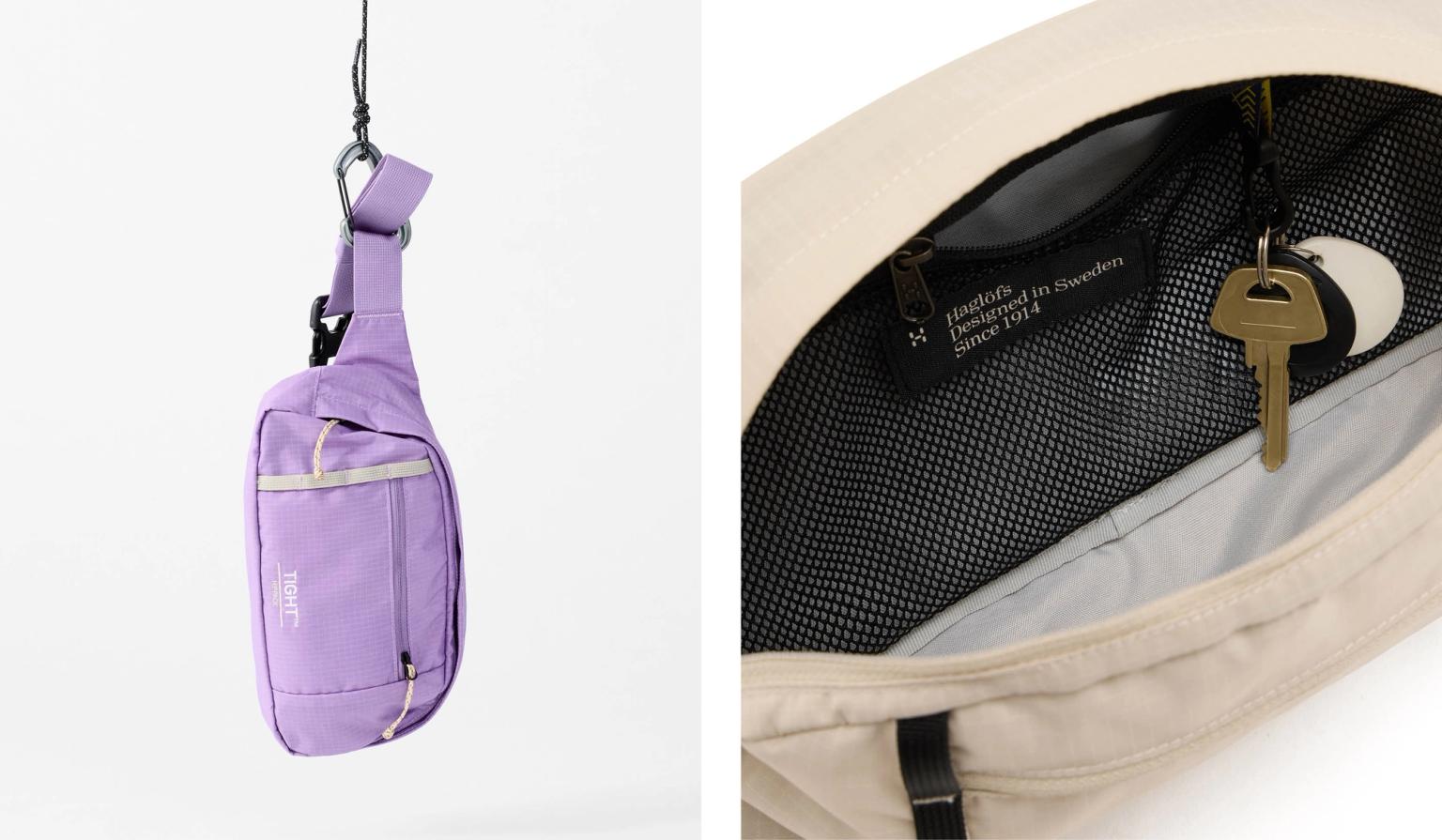 a purple bag is hanging from a hook next to a white bag with a key in it .