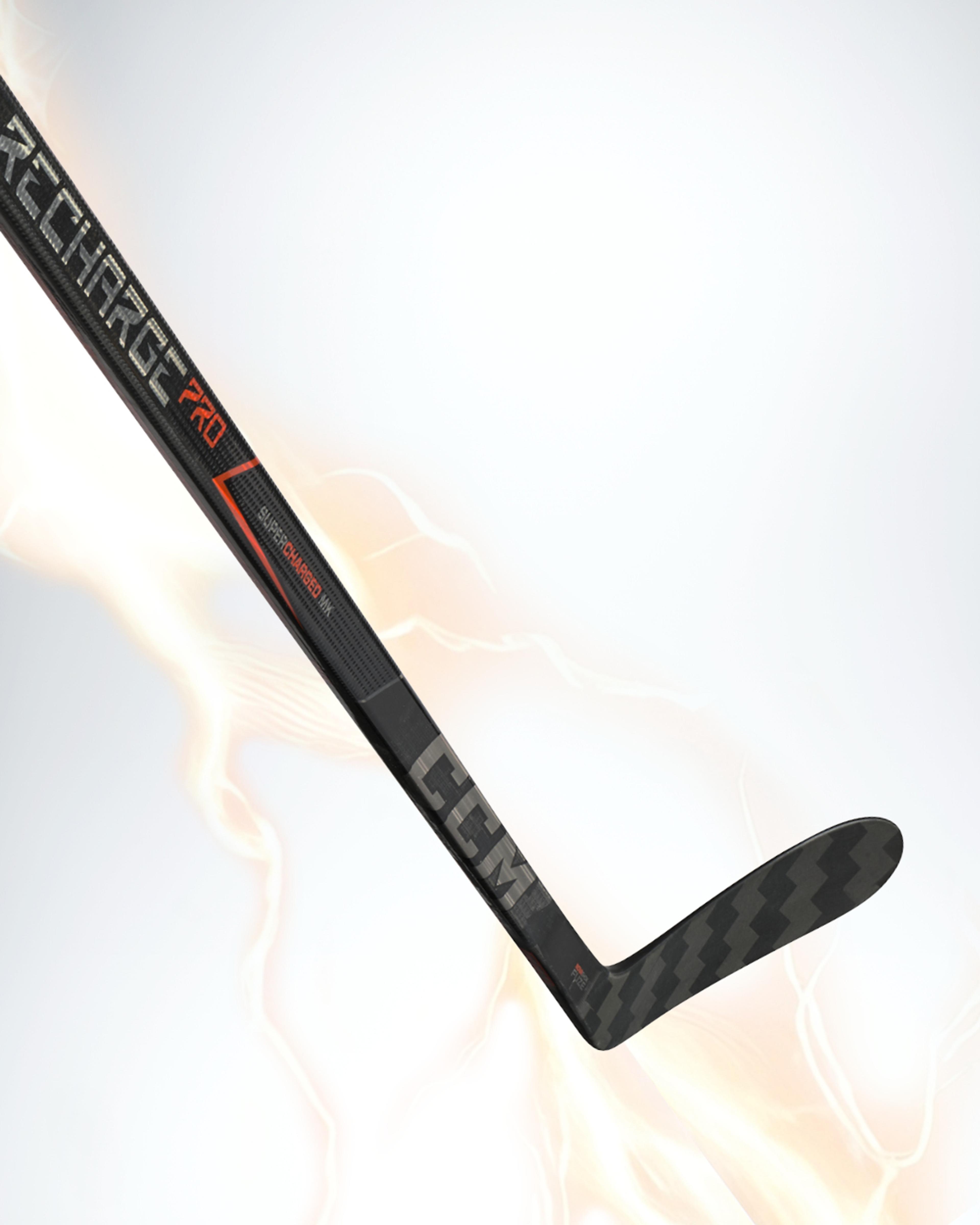 Black CCM Recharge Pro hockey stick with orange accents and a lightning background.