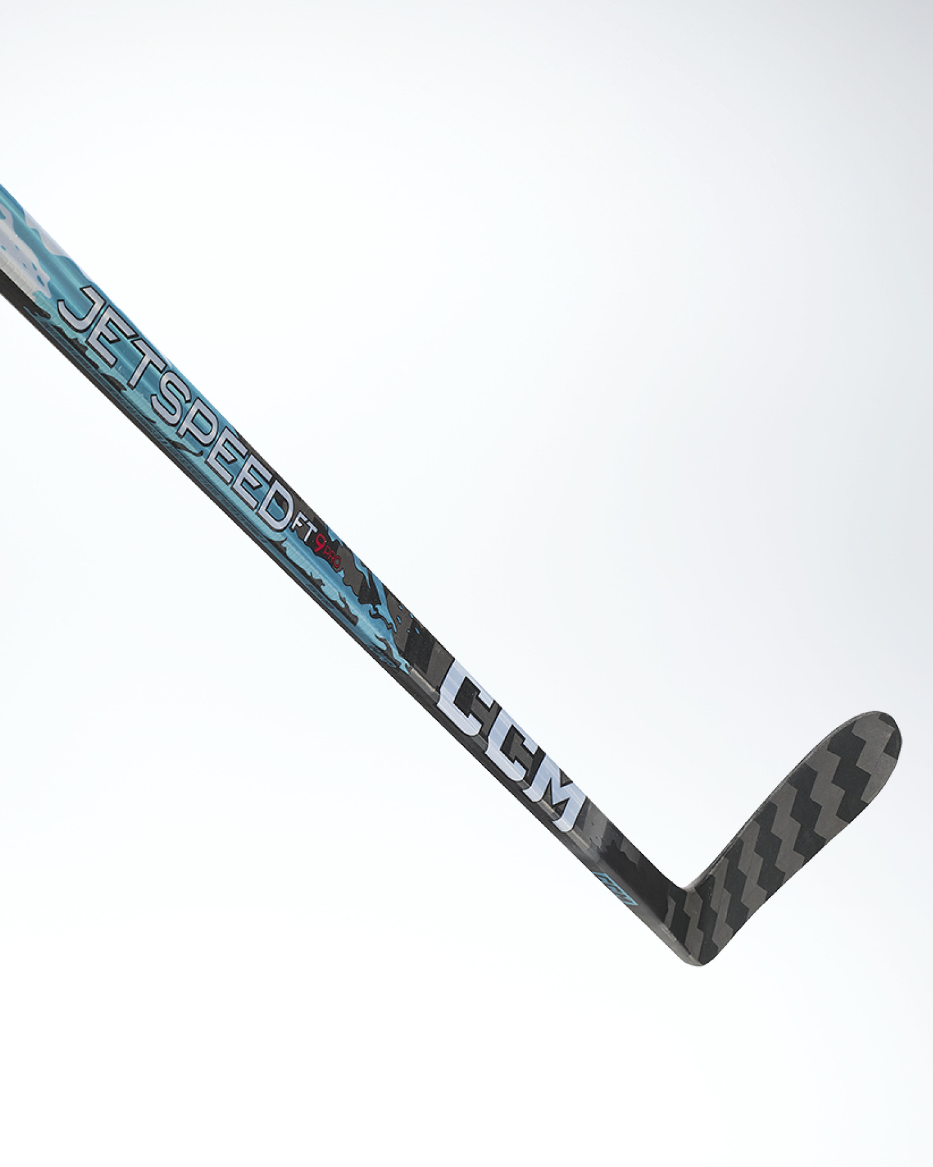 A CCM JetSpeed FT5 Pro hockey stick with blue, black, and grey details against a white background.