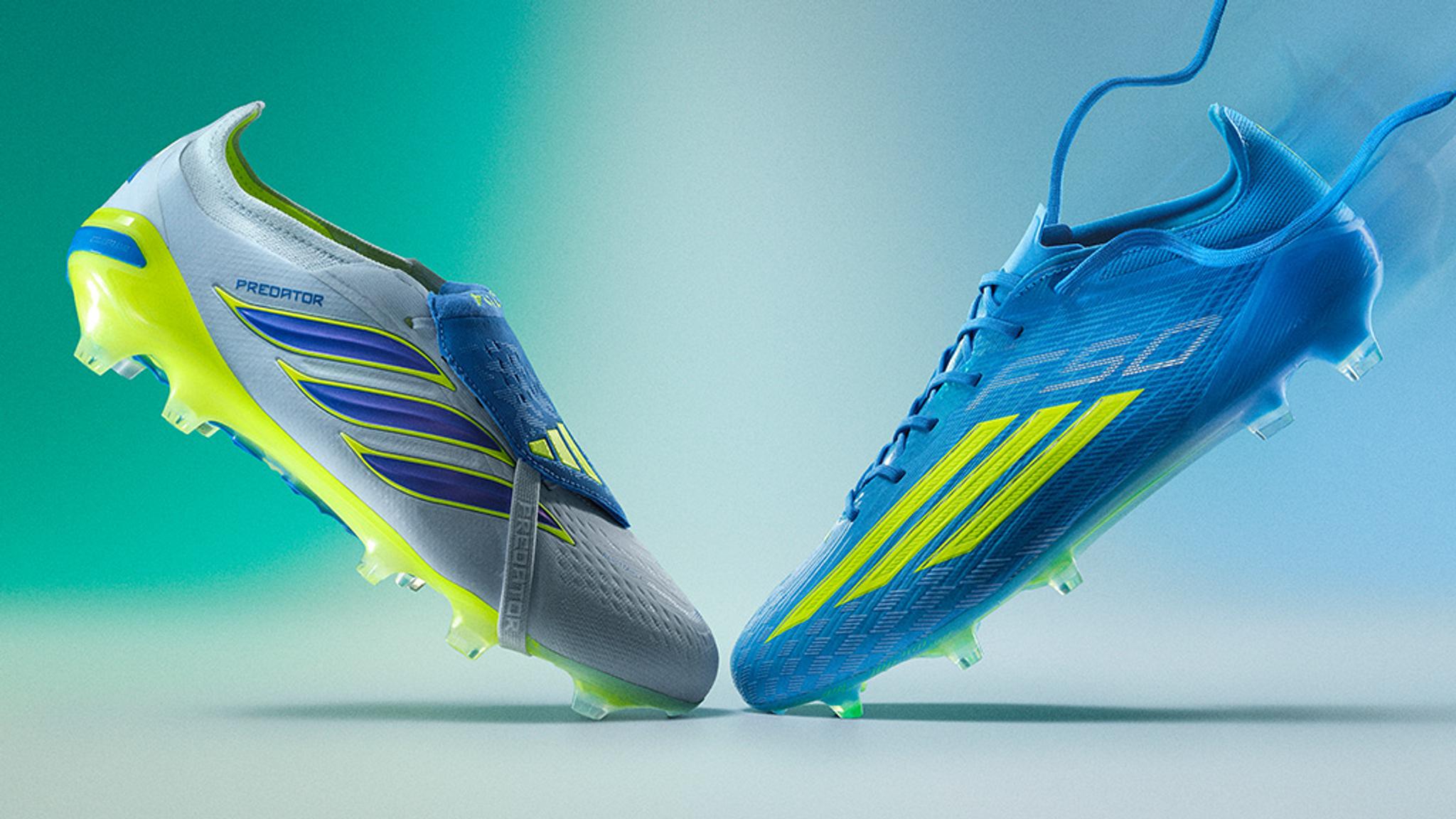Adidas Predator (grey) and F50 (blue) soccer cleats with neon yellow details, floating.