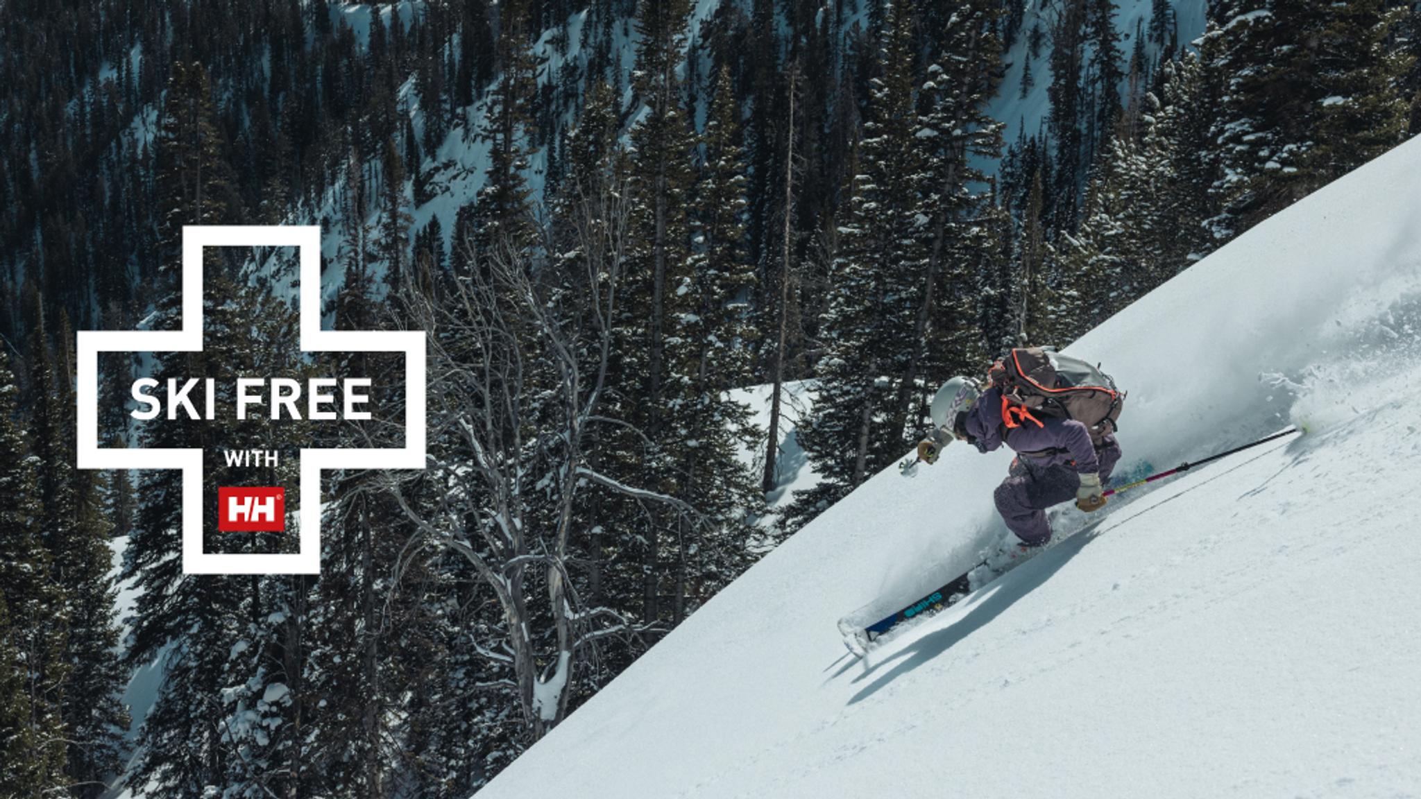 A skier carves down a snowy slope, kicking up powder, with "SKI FREE with HH" overlaid in a white cross shape.