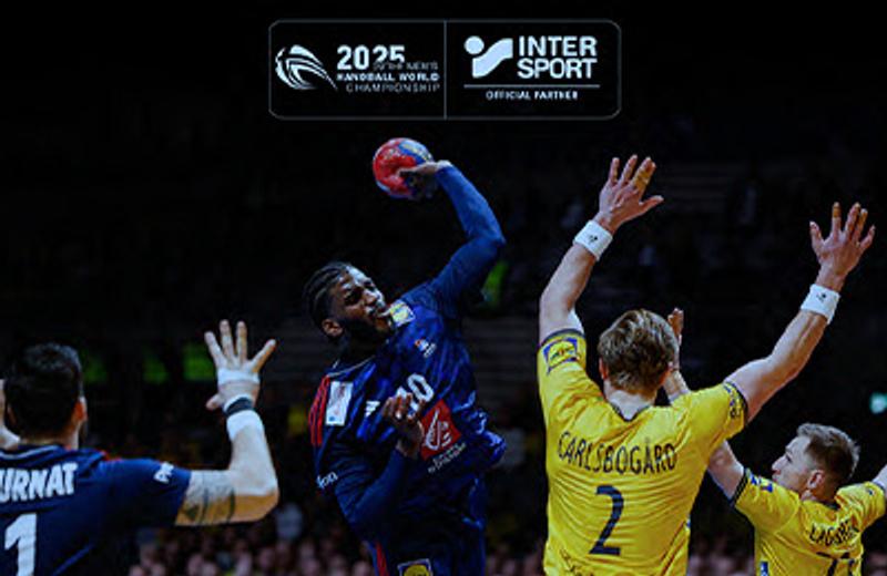 a group of men are playing handball on a court .