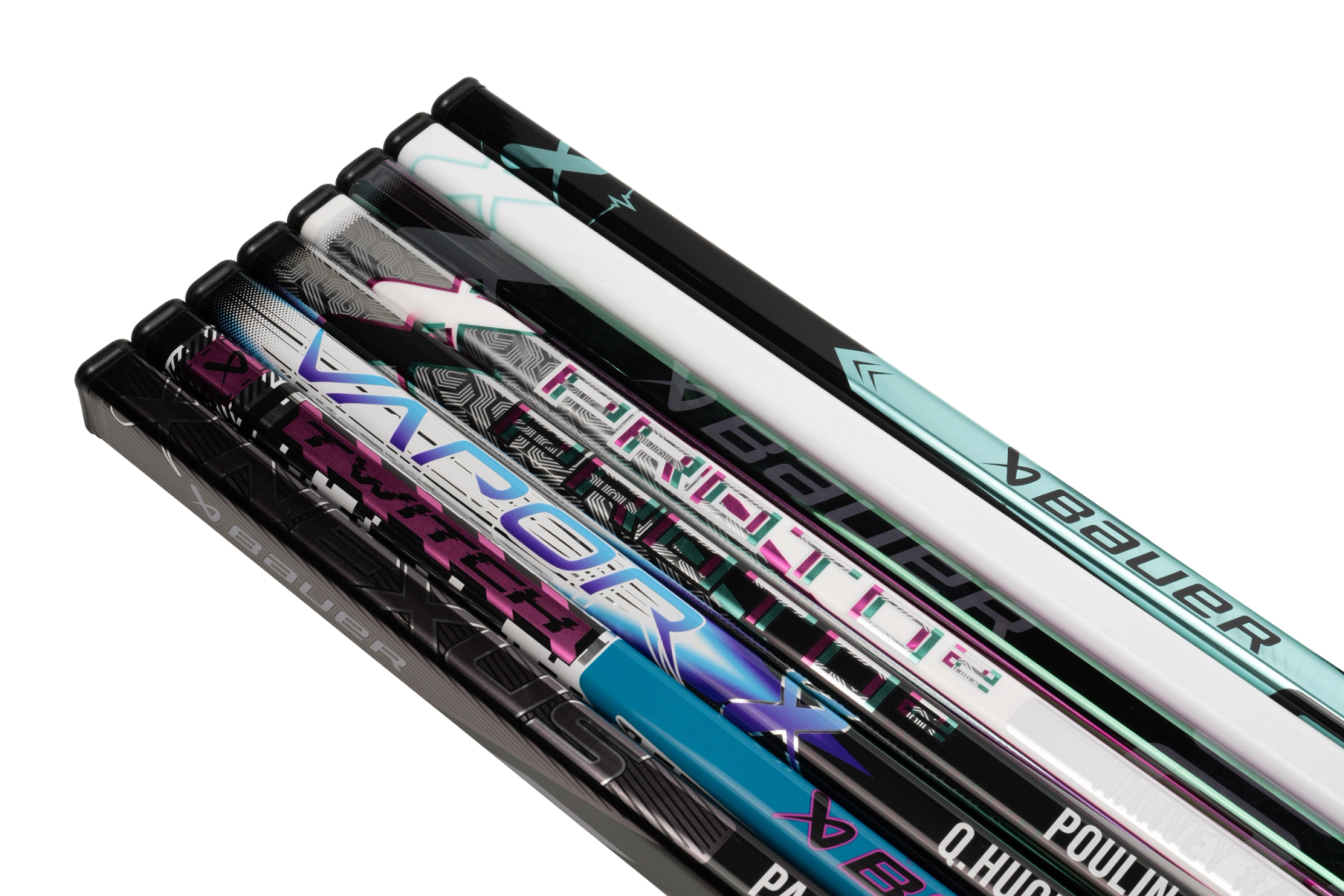 Colorful hockey stick shafts lined up diagonally.