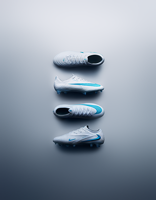 Four white football boots with blue accents, lined up vertically on a grey background.