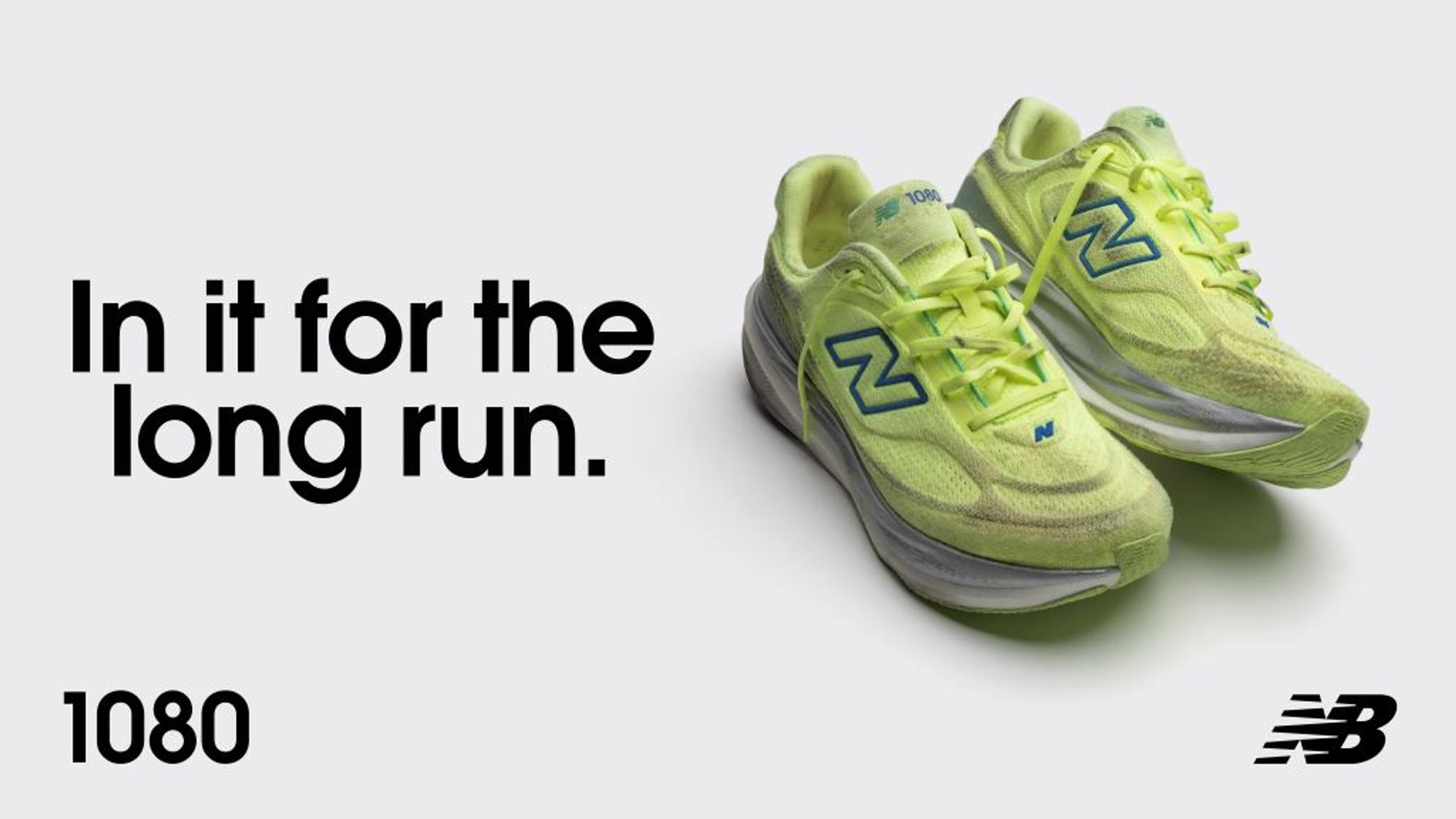 Two neon yellow New Balance 1080 running shoes with blue N logos, alongside the text "In it for the long run. 1080."