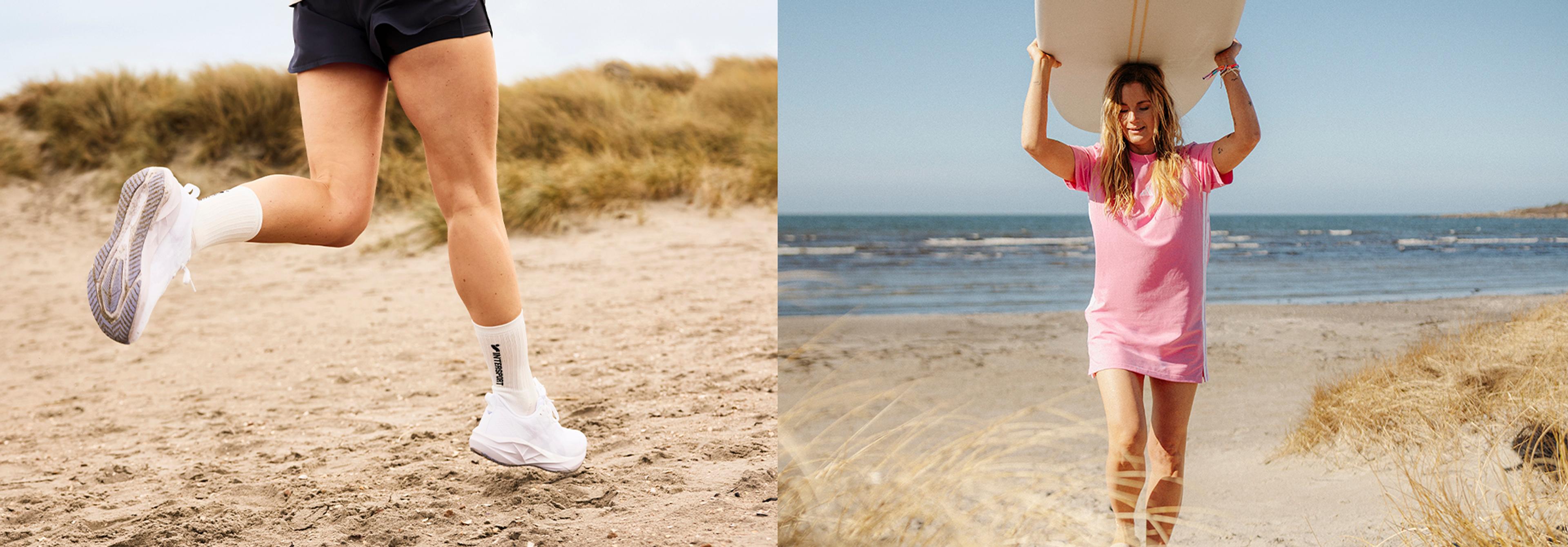 Person running on a sandy beach and a woman carrying a surfboard on a beach.