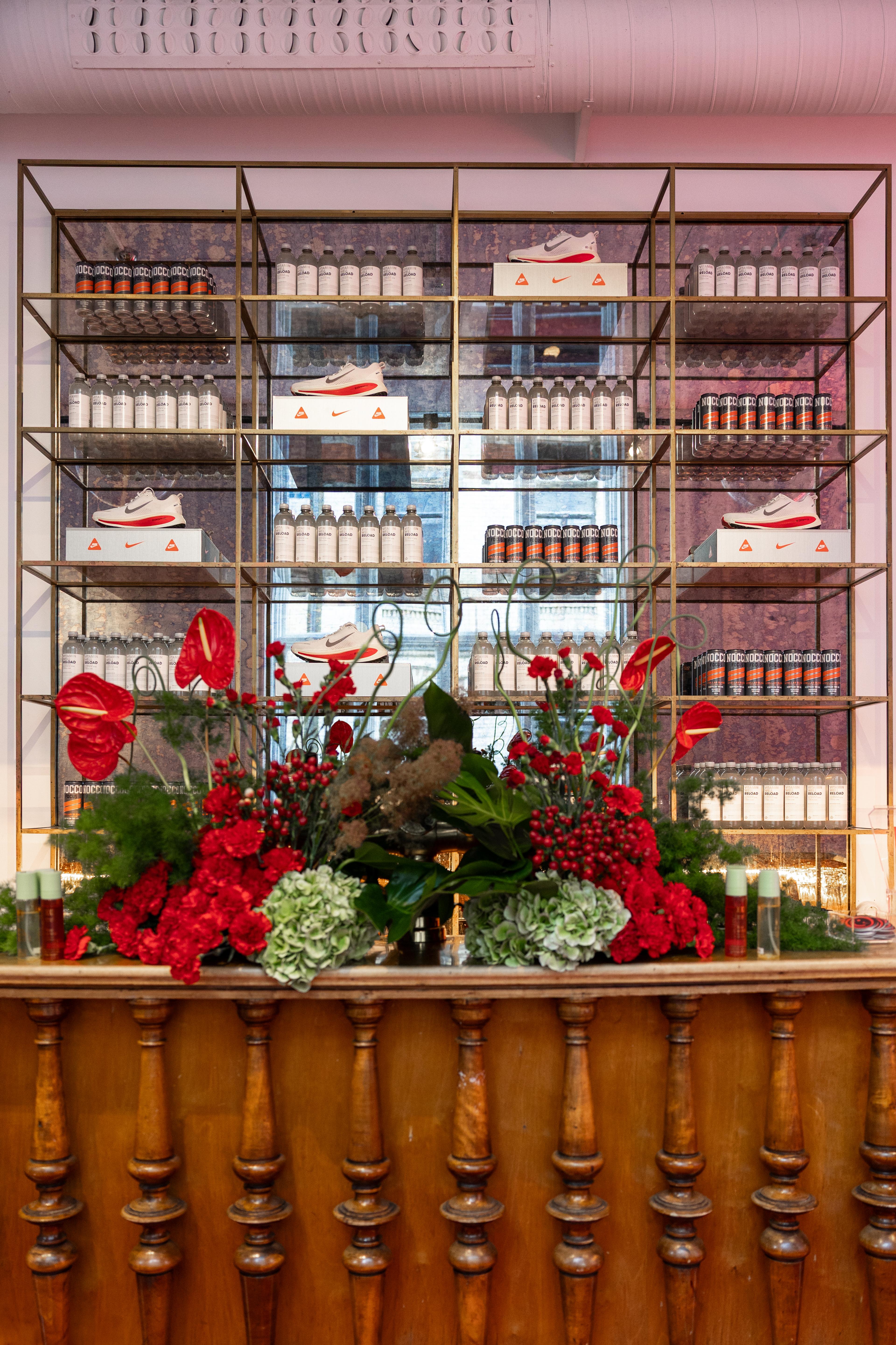 a shelf with a box that says nike on it